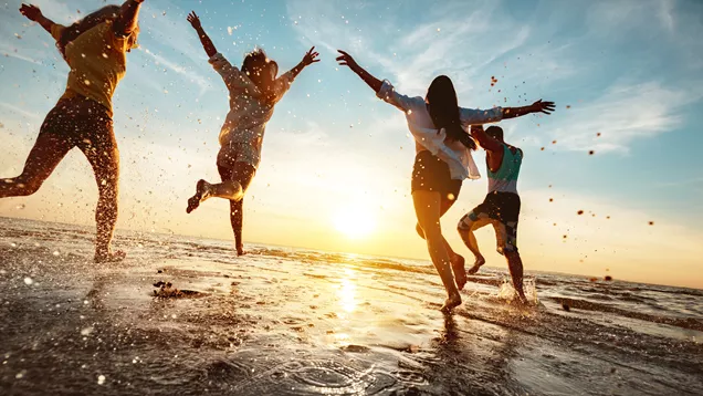 Group Of Teens At The Beach