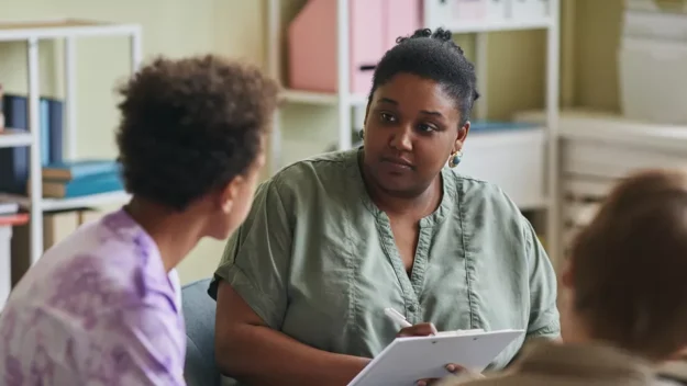 Support Worker having a discussion with a young person