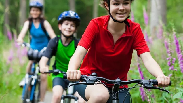 Teenagers On A Bike Ride